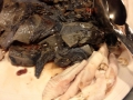 Black chicken with white feet